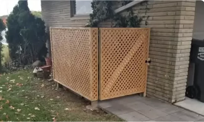 viksburg-waste-container-enclosre-after-aspect-ratio-1000-600 Finished wood lattice waste container enclosure built beside a brick home to screen trash bins and improve the exterior utility area